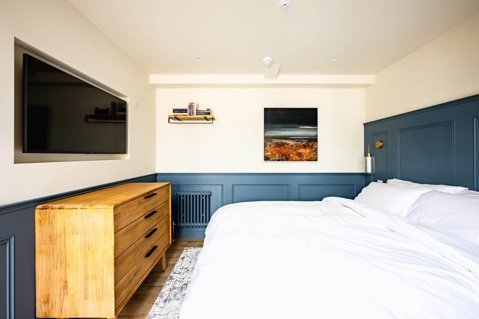 The Hayloft bedroom with panelled headboard wall