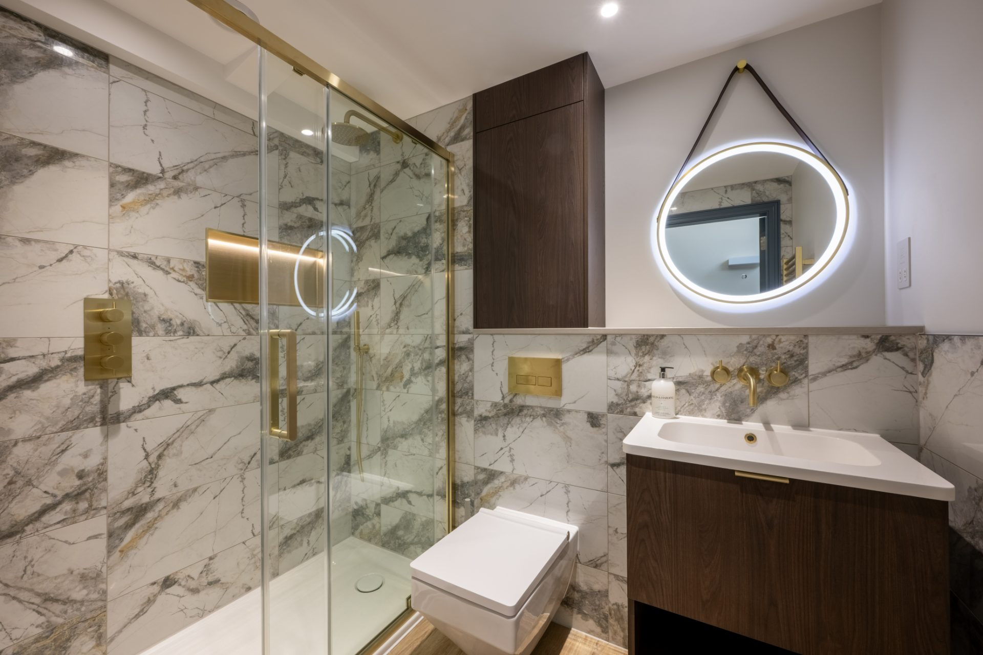 The Hayloft marble wetroom with walk-in shower