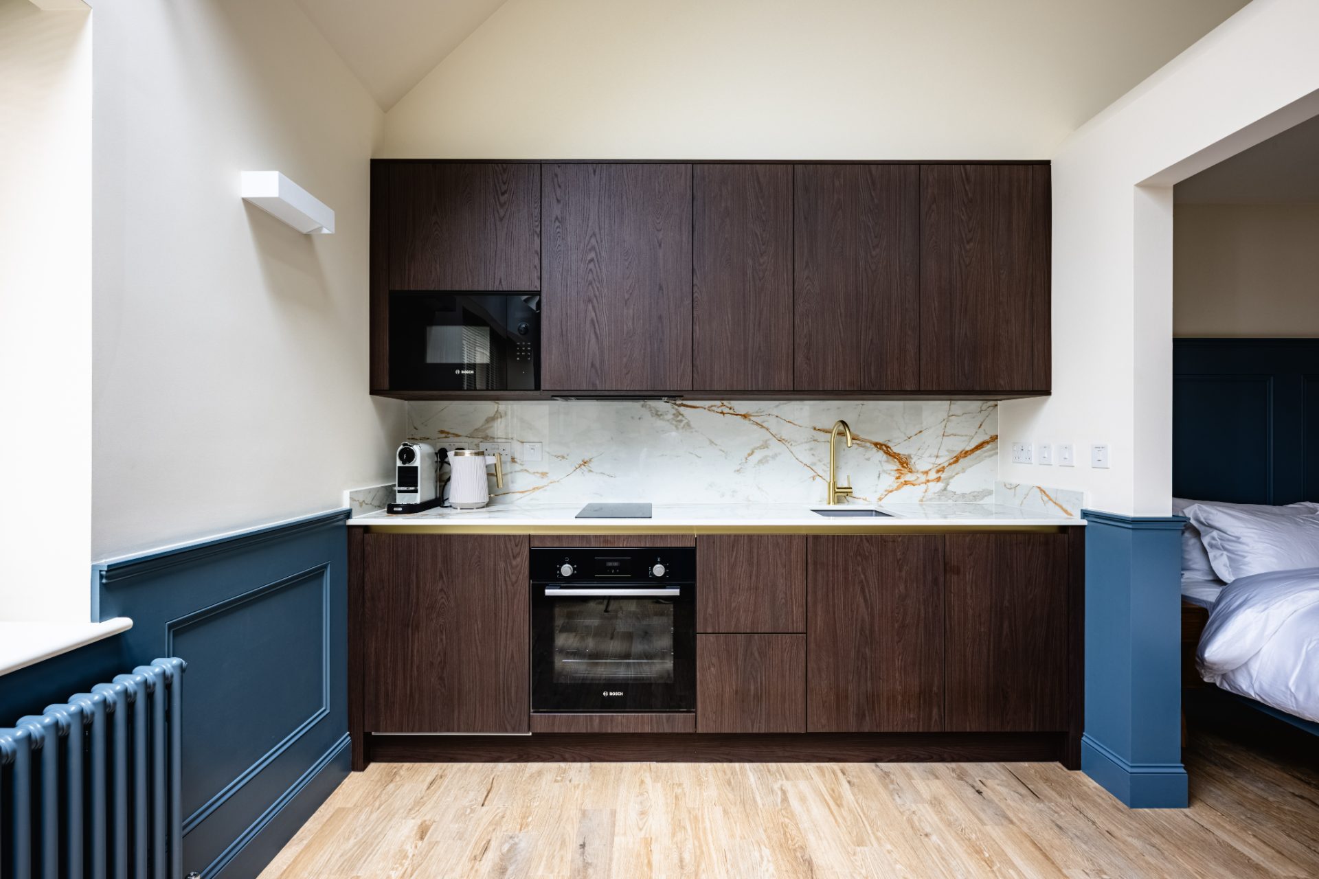 The Bield kitchen with marble splashback and brass tap